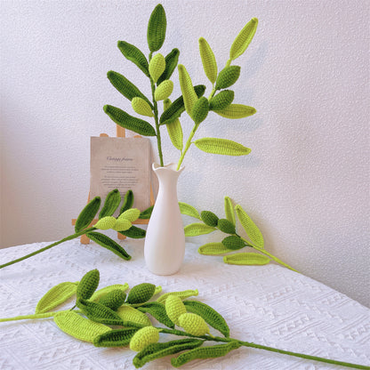 Oasis méditerranéenne : feuilles d'olivier au crochet fabriquées à la main avec piquet d'olivier pour un décor de jardin naturel