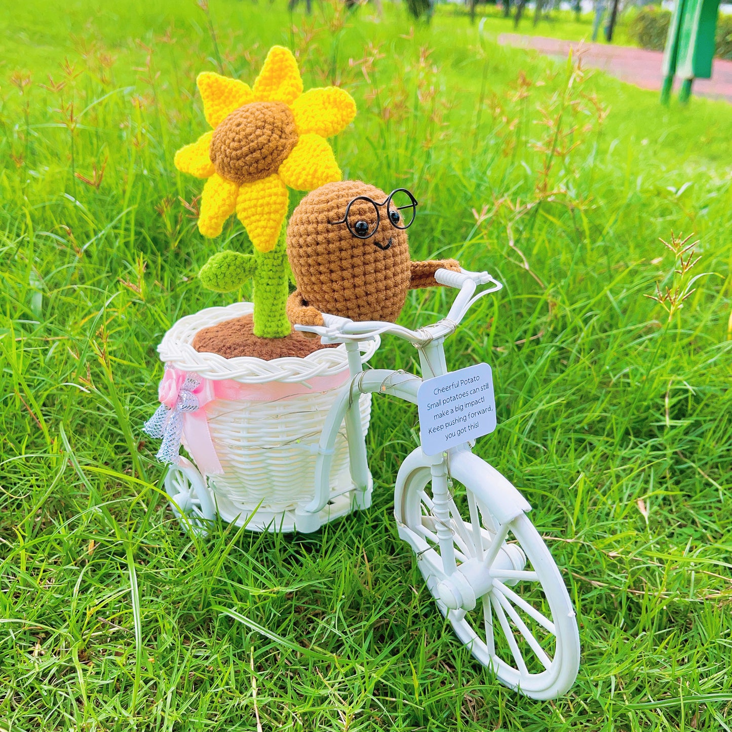 Whimsical Sunflower Pot on Bicycle: Hand-Woven Flower Basket with Sunflower Pen, LED Wire Wrap, and Positive Lemon Crochet Plushie
