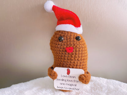 Handgefertigte Liebesbohne mit gemütlicher Weihnachtsmütze und Grußkarte – perfekt für Weihnachtsdekoration und Geschenke