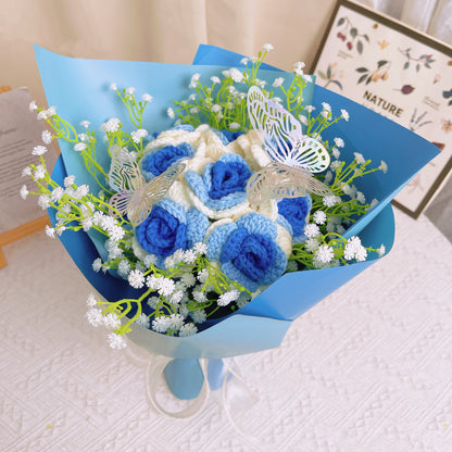 Frozen White-to-Blue Gradient Roses Bouquet with White Baby's Breath and Vibrant Colorful Butterfly Accents, Beautifully Wrapped in Light and Dark Blue Papers, Ideal for Princess-like Celebrations