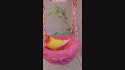 Happy Strawberry Design Parrot Bird Nest, equipped with hooks and plastic chains, suitable for cage use. The cotton-filled half-moon shape provides a comfortable sleeping spot for pet birds.